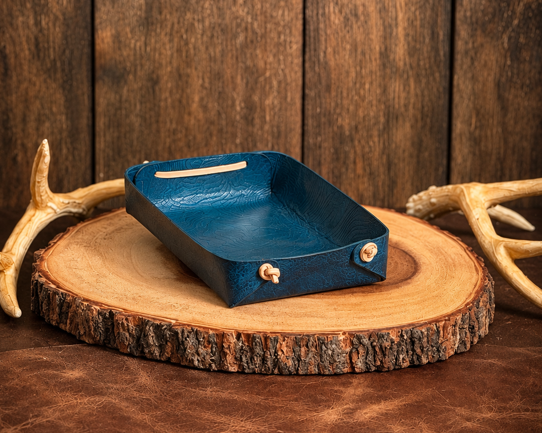 Deep Blue Water Basecamp leather valet tray with topographic detail and corded corners