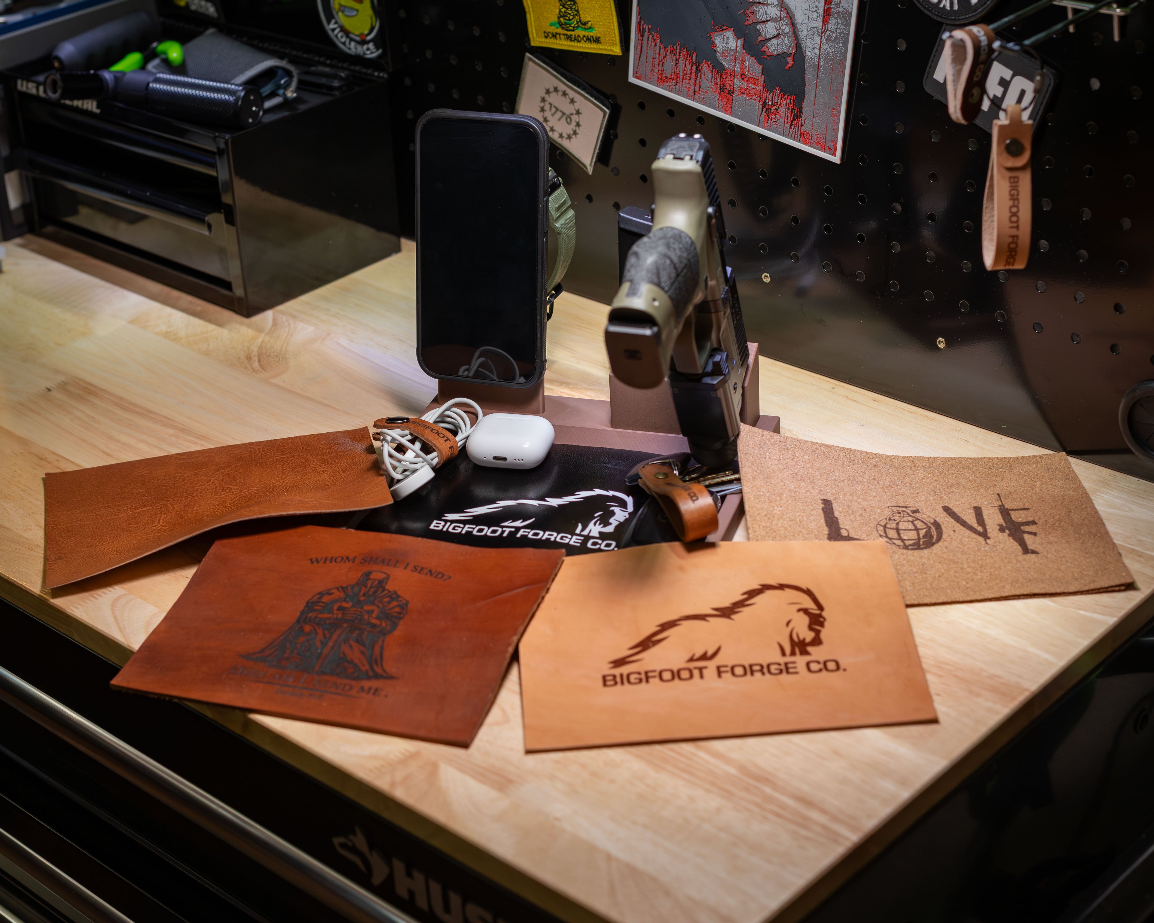 FDE tactical EDC valet tray with pistol stand, iPhone and Apple Watch charger, and multiple leather liner options with custom engraving examples
