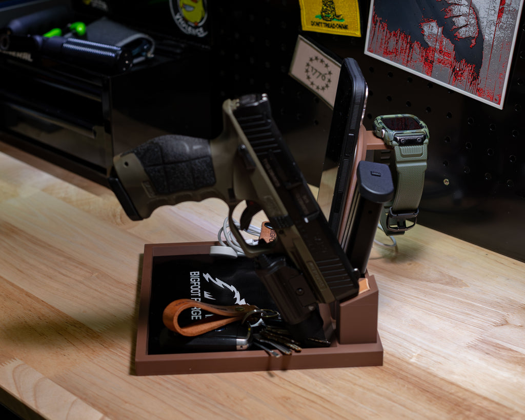 FDE tactical EDC valet tray side profile showing pistol stand, magazine holder, iPhone dock, and Apple Watch charger