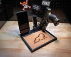 Tactical EDC valet tray in black with pistol stand, magazine holder, iPhone dock, and Apple Watch charger with leather liner