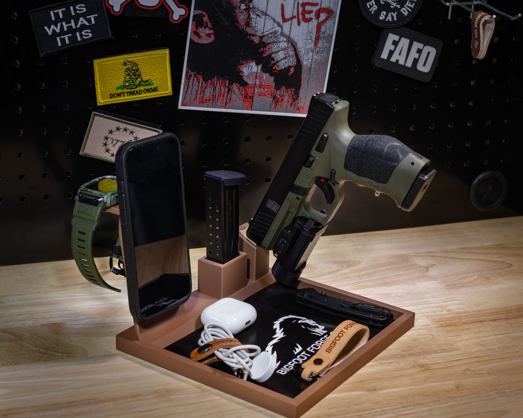 Tactical EDC valet tray in FDE with pistol stand, magazine holder, iPhone dock, and Apple Watch charger with leather liner