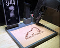 Tactical EDC valet tray in gray with pistol stand, magazine holder, iPhone dock, and Apple Watch charger with leather liner