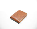 Bourbon Topo Forgehand Standard bifold with baby blue stitching on a neutral white background