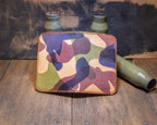 Woodland Camo wallet opened flat to show the full camouflage leather exterior and orange stitching.